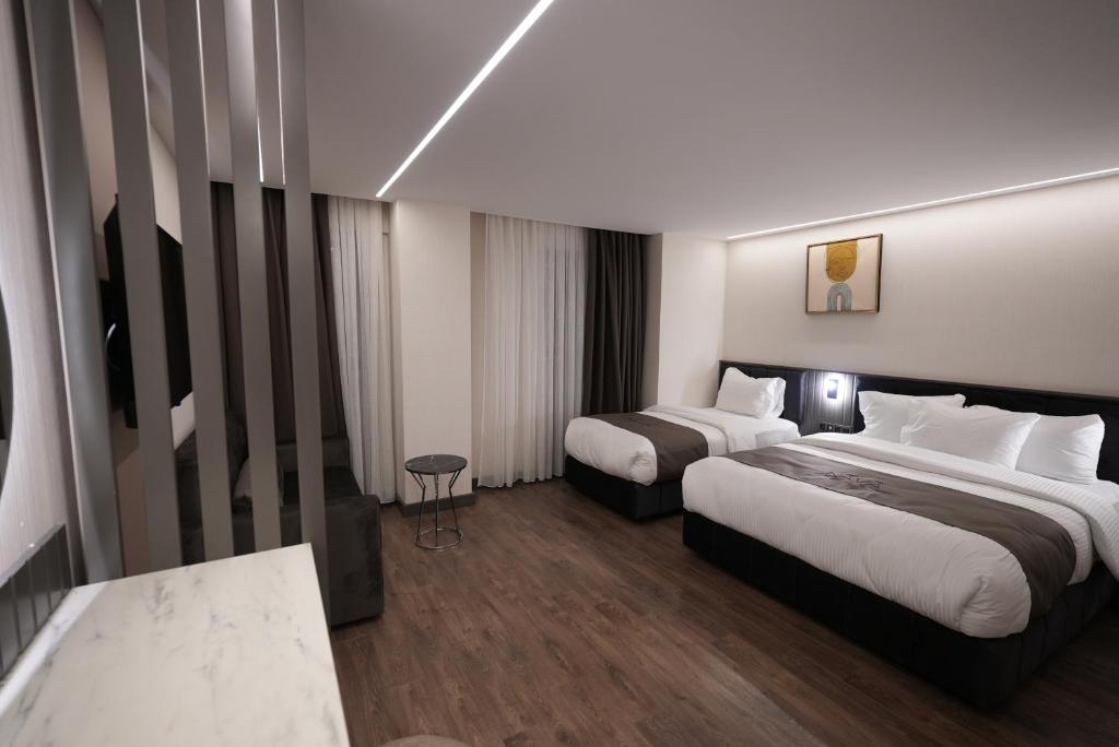 The Nava Hotel - Quadruple Room