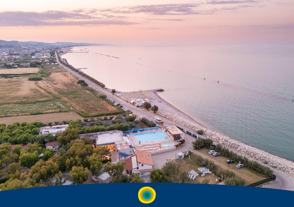 an aerial view of a beach and the water at Club del Sole Roseto degli Abruzzi Easy Camping Village in Roseto degli Abruzzi