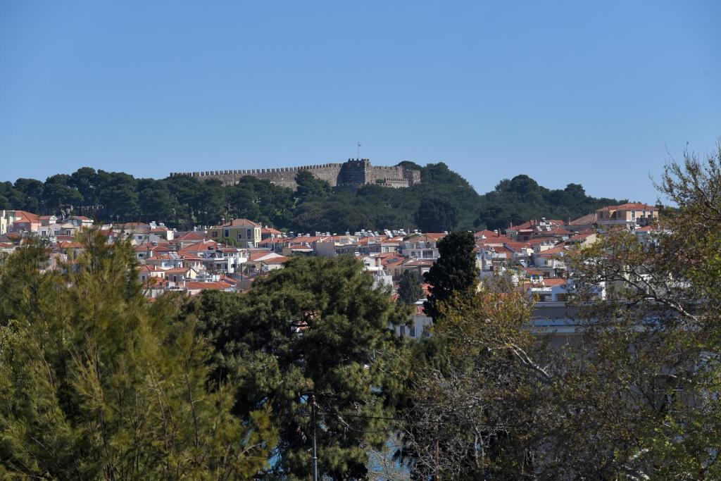 a view of a city with a castle on a hill at The ViewPoint VP2 - Το διαμάντι της θέας in Mytilene