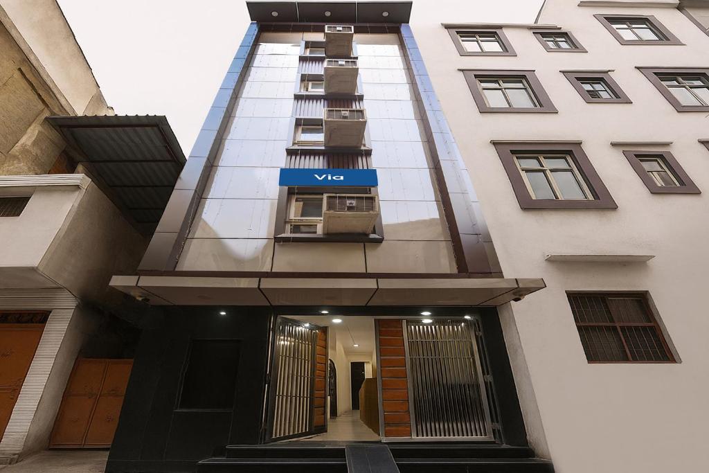 a building with a vico sign on the side of it at Via The Arrow in New Delhi