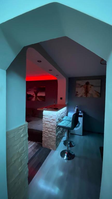 a room with a desk and a chair and a bed at Modern Stay Provadia in Provadiya