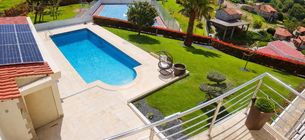 an overhead view of a swimming pool on a house at Casa Encosta do Marao in Amarante