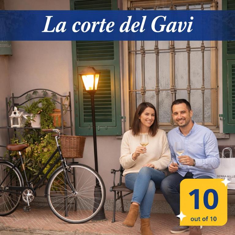 a man and a woman sitting on a bench with glasses of wine at La corte del Gavi in Bosio