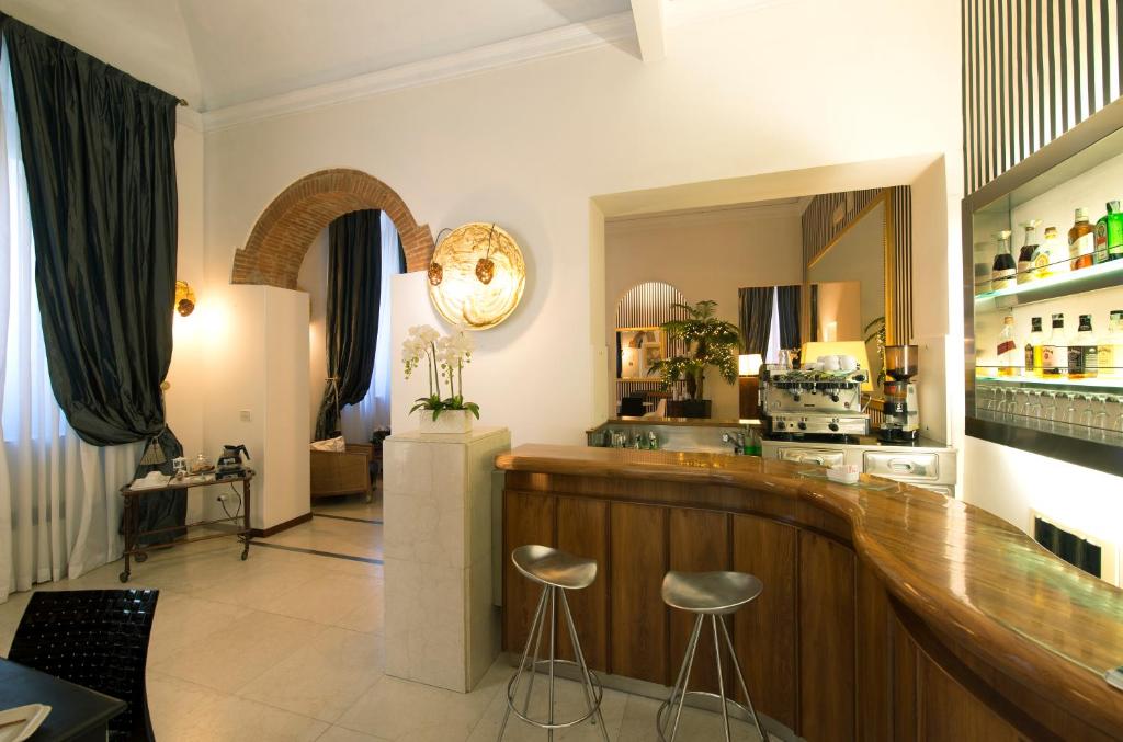 Nápoje v ubytovaní Hotel De La Pace, Sure Hotel Collection by Best Western