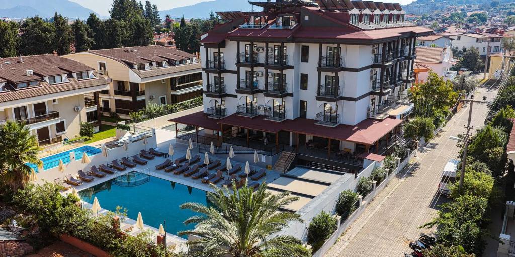 an aerial view of a building with a swimming pool at 7 Brothers Hotels in Marmaris