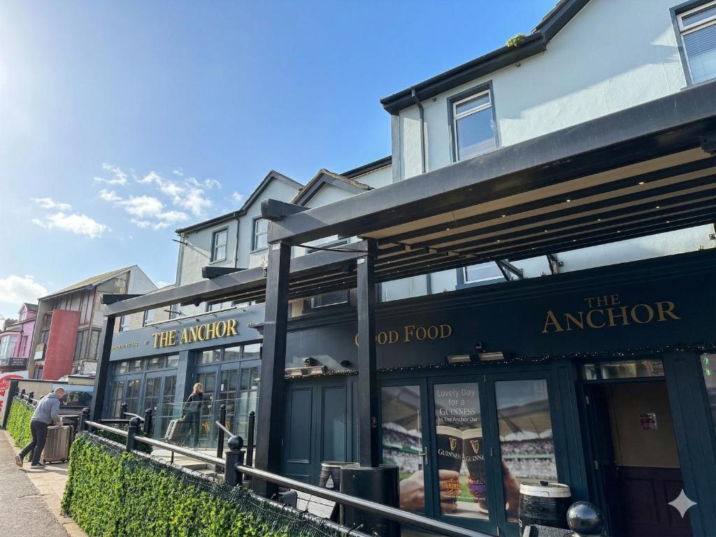 a store front of a building with a restaurant at Anchorage Inn in Portstewart