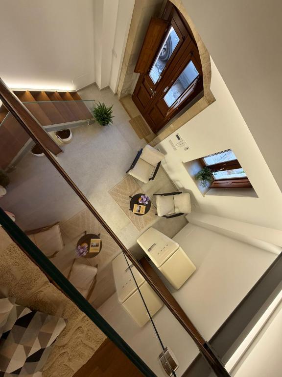 an overhead view of a staircase in a house at Donna Dina in Avola