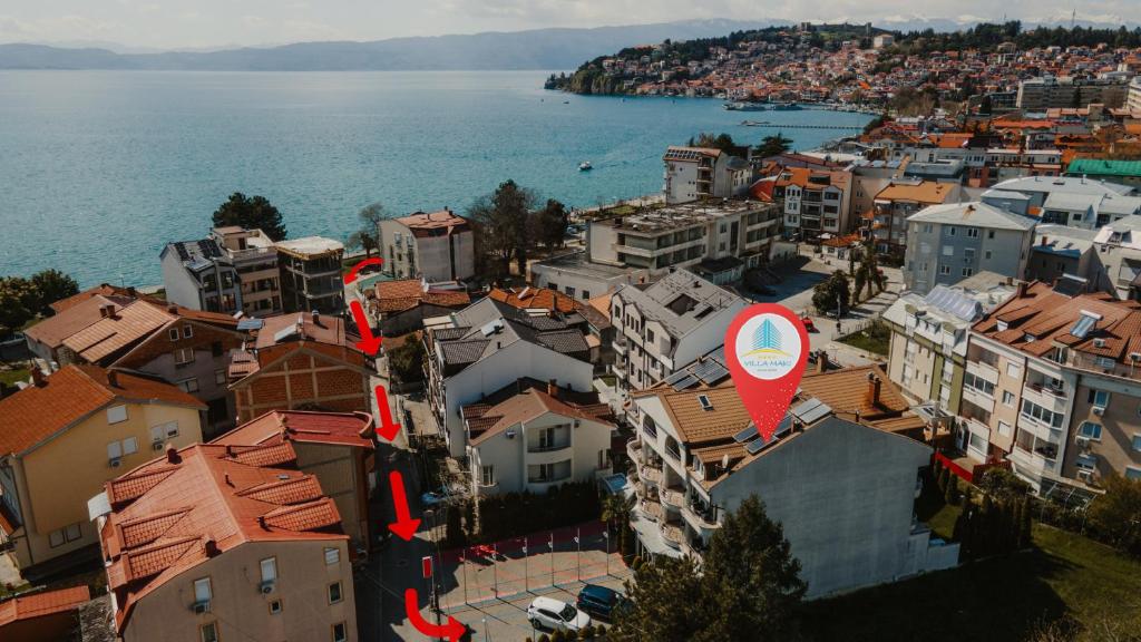 an aerial view of a city next to the water at Villa Maki in Ohrid