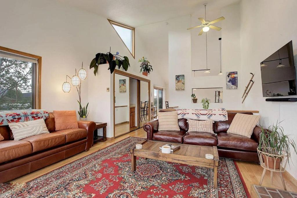 a living room with a couch and a coffee table at 534 Sun River #8 in Fraser