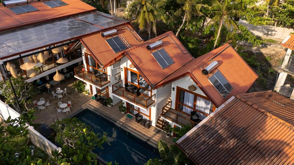 an aerial view of a house with a swimming pool at I Ahangama - 100m to Kabalana Beach in Ahangama