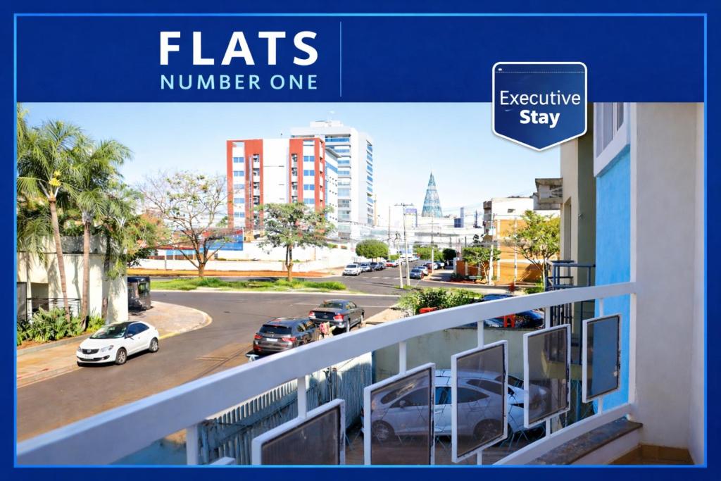 a magazine cover of a balcony with cars on a street at Flats Number One in Ribeirão Preto