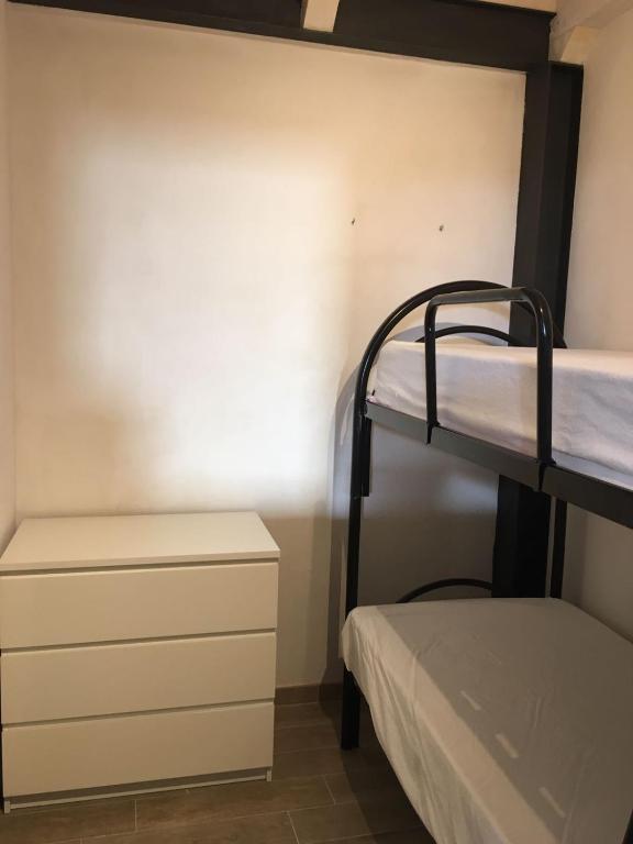 Posteľ alebo postele v izbe v ubytovaní Casa Vacanza Piazza Gramsci 1