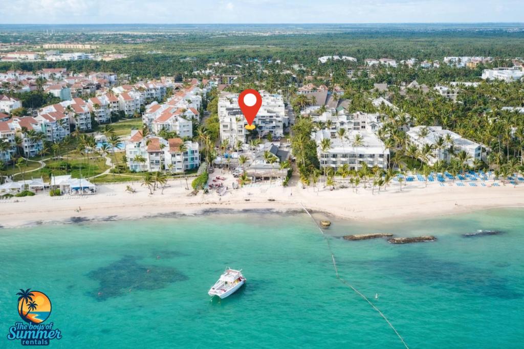 an aerial view of a beach with a red balloon at 1 min walk beach,bars,grocery in Punta Cana