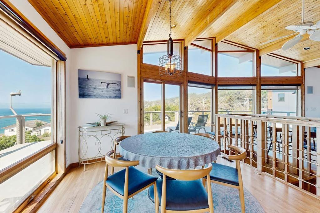 a dining room with a table and chairs at Gualala Harmony House in Gualala