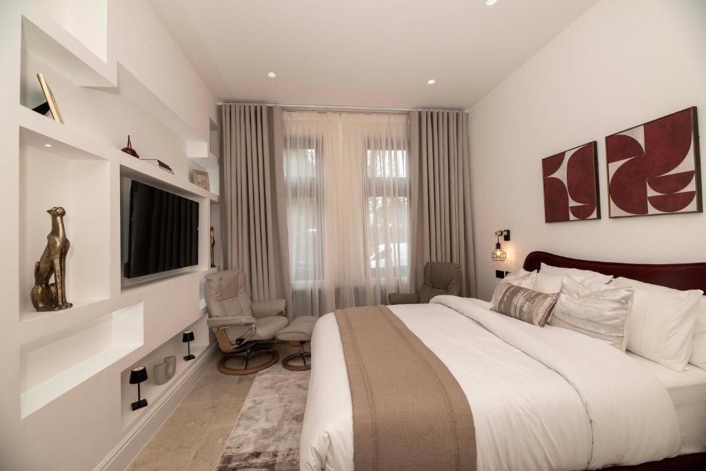 Moseley Luxury Stay - 高级特大号床间
