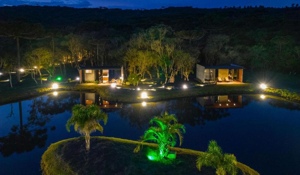 an aerial view of a house at night at Pousada Recanto do Sambaqui in Balsa Nova