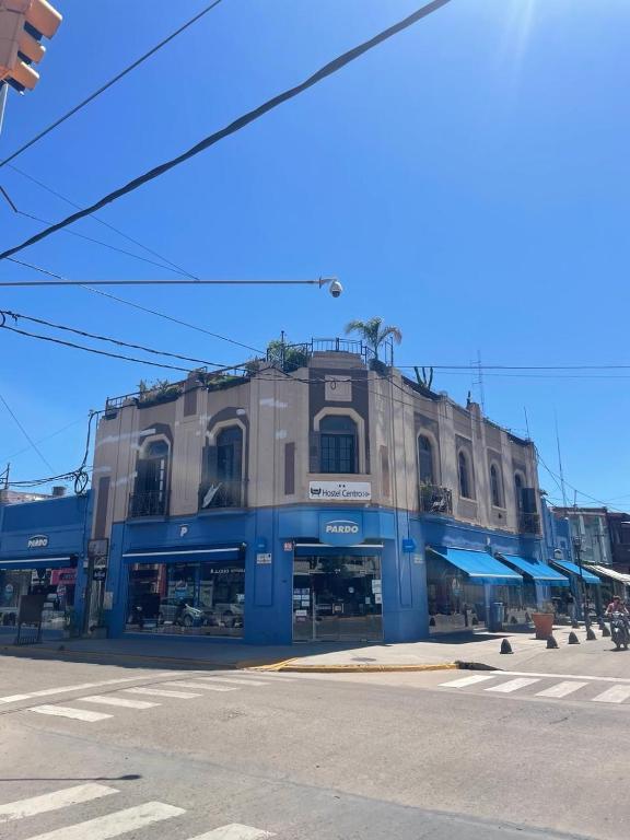 a building on the corner of a street at Republica Hostel in San Pedro