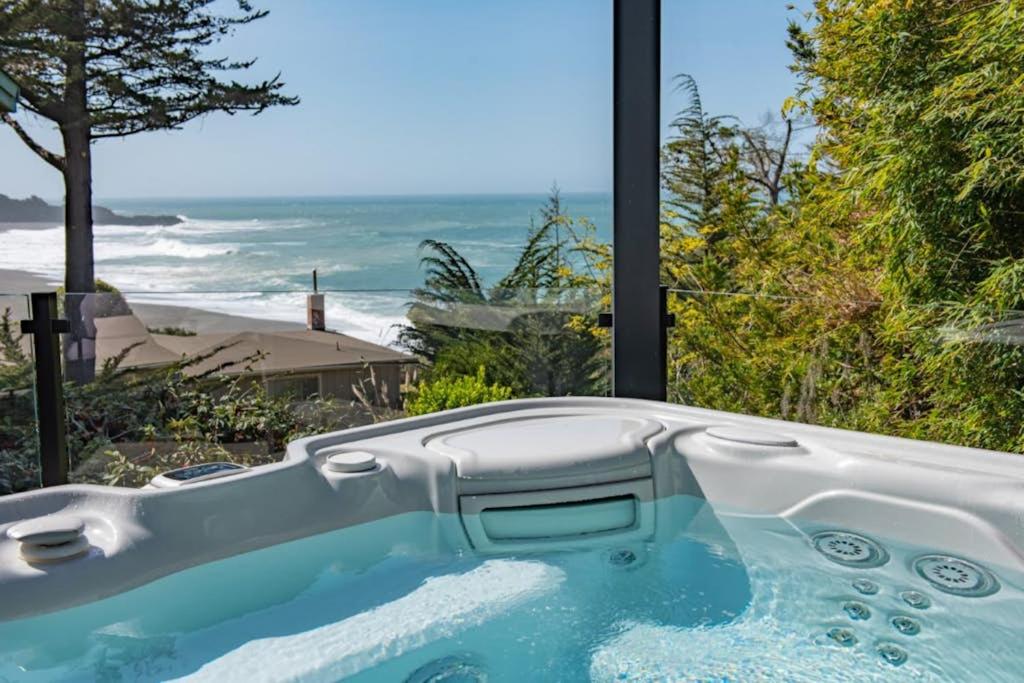 a bath tub with a view of the ocean at Eagle's Landing - Main House & Studio in Gualala