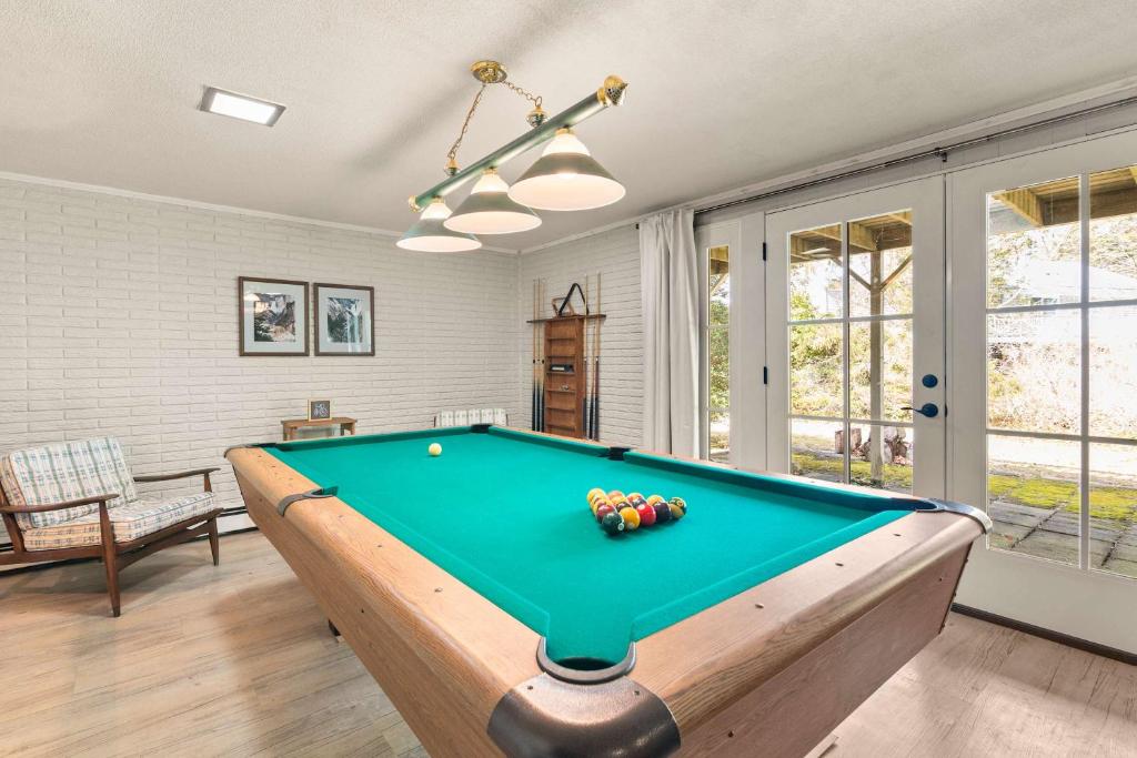 a living room with a pool table at Central AC Game Room Dog-Friendly in Chatham