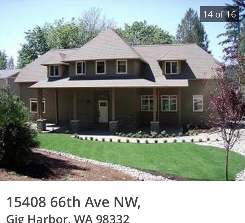 a picture of a house with a sign that reads avenue n at Waterfront home in Gig Harbor