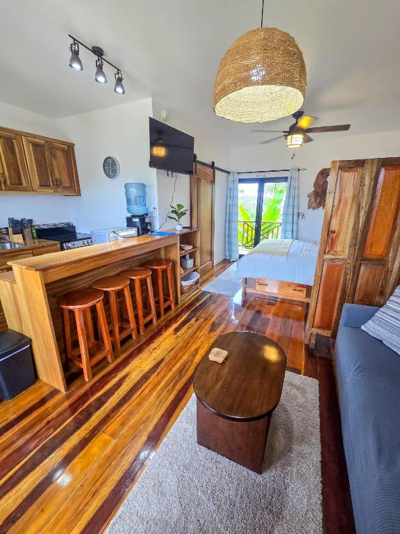 a living room with a couch and a table at Sand and Sol Rental in Hopkins