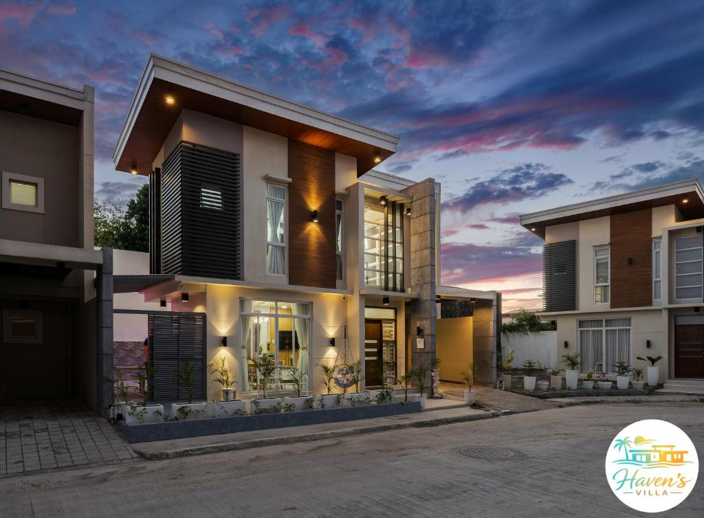 a rendering of a house at dusk at Haven's Villa in Agus