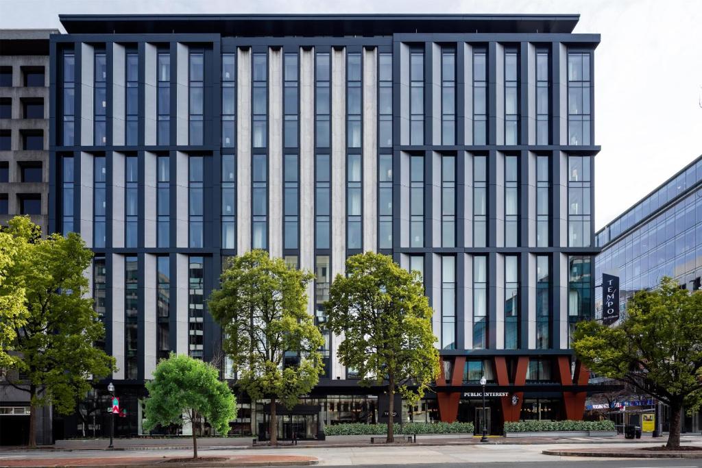 an office building with a lot of windows at Tempo By Hilton Washington Dc Downtown in Washington, D.C.