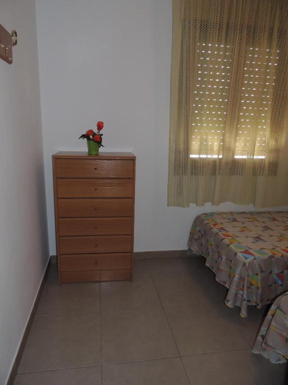 Postel nebo postele na pokoji v ubytování Apartamento Nuria Los Abanicos