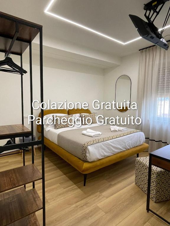 a bedroom with a bunk bed and a table at Wanda's House in Caserta