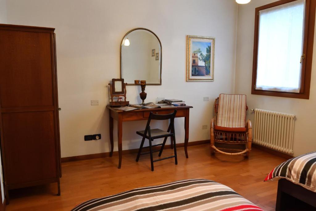 Łóżko lub łóżka w pokoju w obiekcie Agriturismo Memento