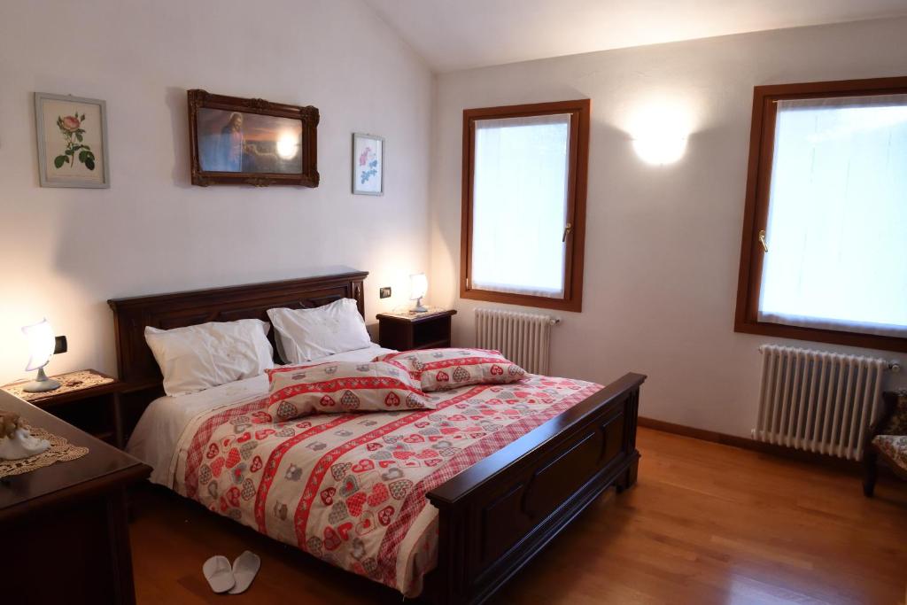 Łóżko lub łóżka w pokoju w obiekcie Agriturismo Memento