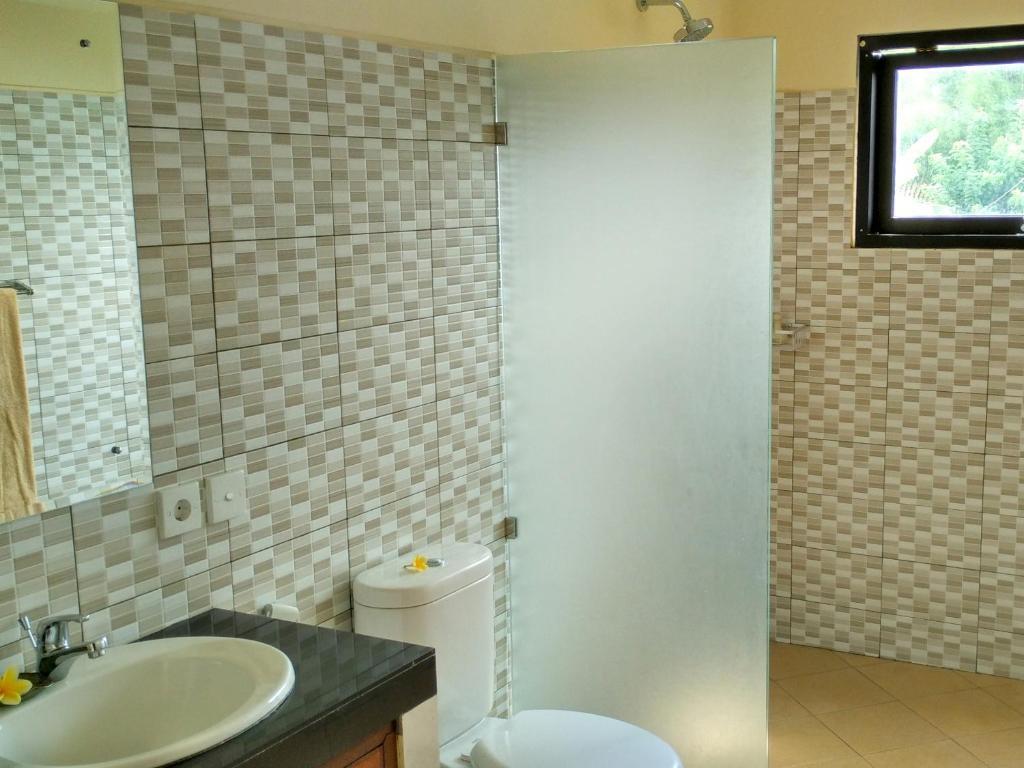 Nyoman Sandi Guest House - 9