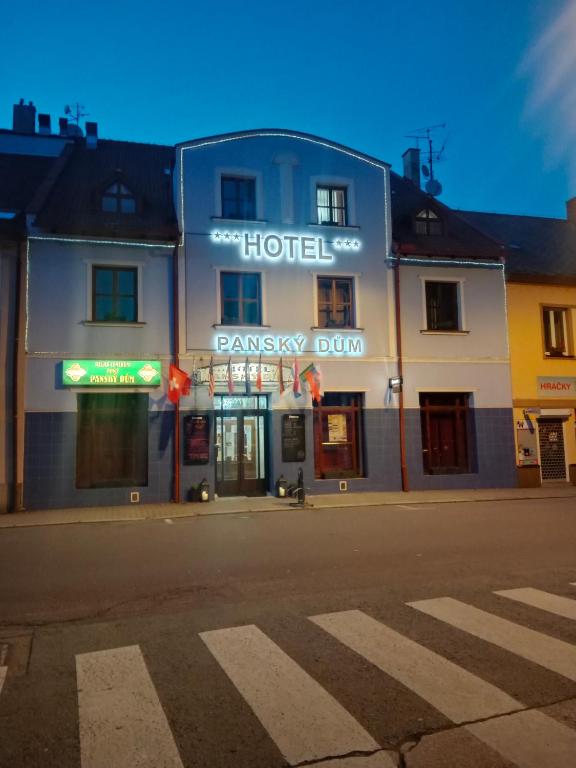 a hotel on the corner of a street at Hotel Panský dům in Kostelec nad Orlicí