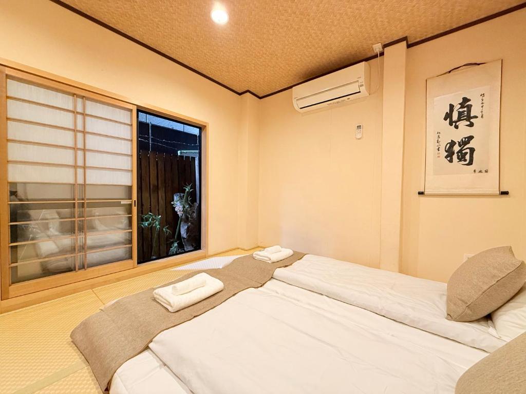 难波4分钟车站旁 机场直达 通天阁 心斋桥 梅田 Usj 全新日式 2卧室1厨1卫1浴 最大5人