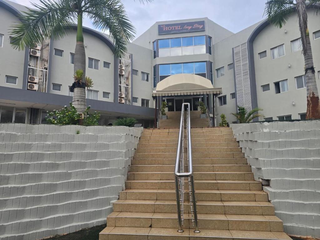 a set of stairs in front of a building at Hotel Izzy Stay in Maputo