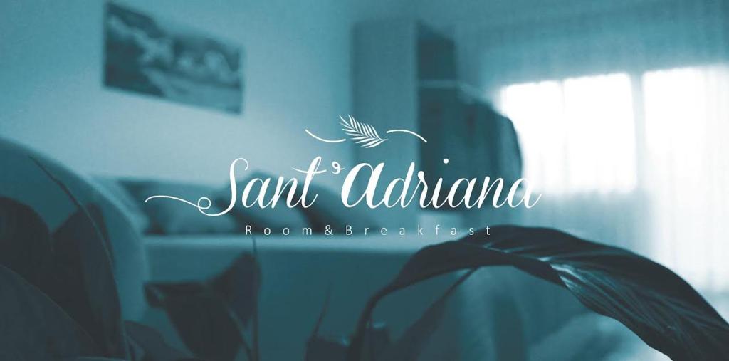 un logo per un ristorante con sopra un uccello di Sant'Adriana a Reggio di Calabria