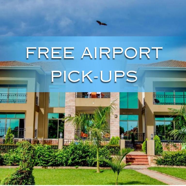 a large apartment building with the words free airport pick ups at Lakepoint Villa in Entebbe
