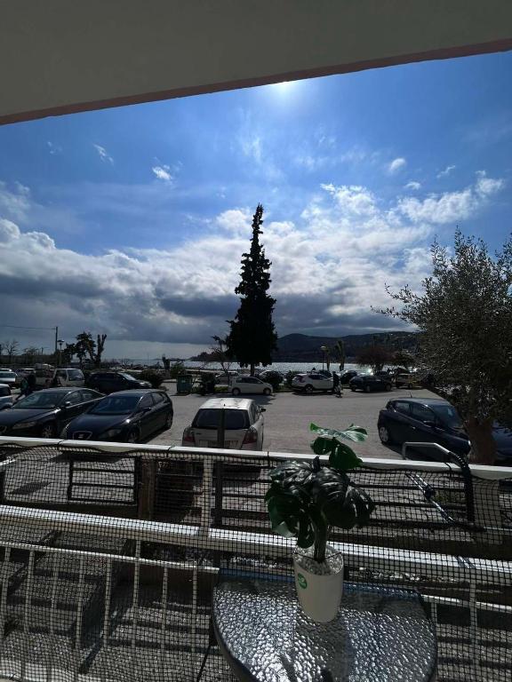 a view of a parking lot with cars parked at Ammos in Kavála
