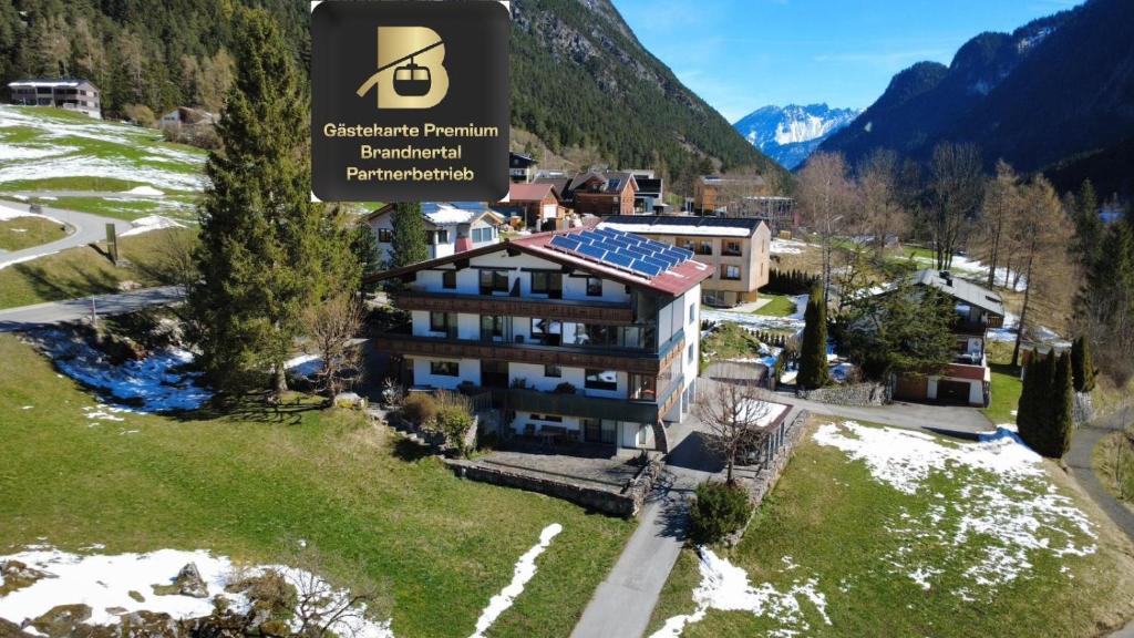 an apartment building with solar panels on the roof at Haus Kella-Egg in Brand