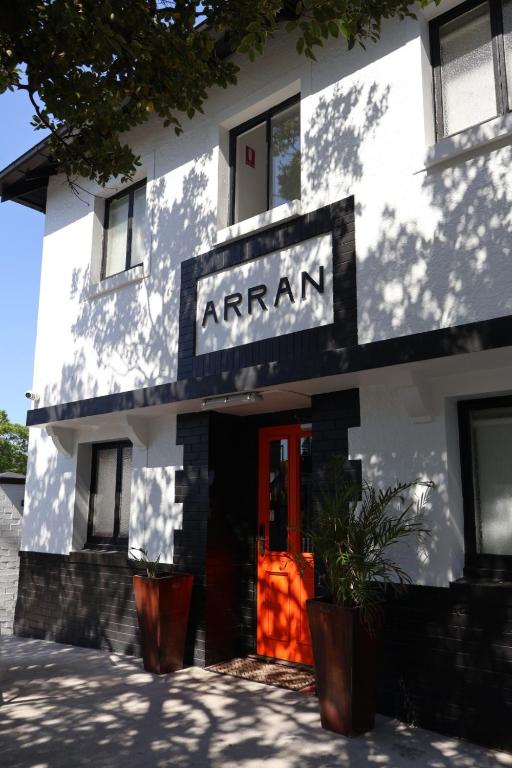 a white building with a sign that readsarma at K2 Brisbane in Brisbane