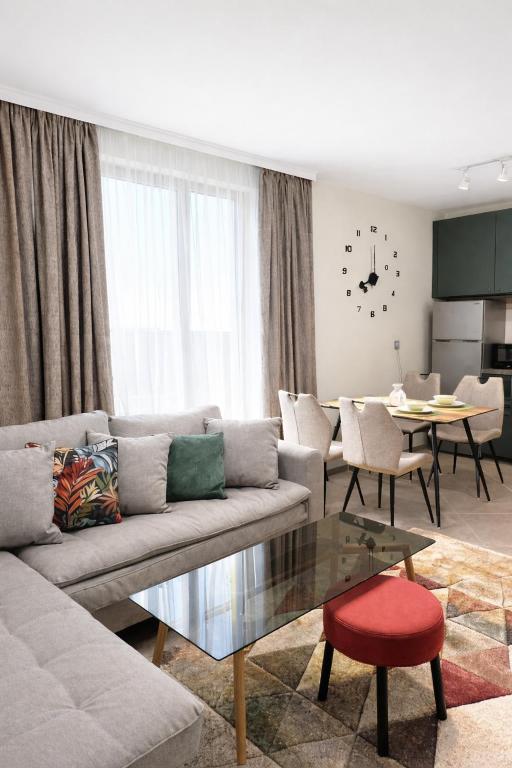 a living room with a couch and a table at Fresh SPA Relax Velingrad in Velingrad