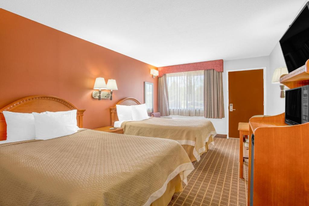 Postel nebo postele na pokoji v ubytování Days Inn by Wyndham Elko
