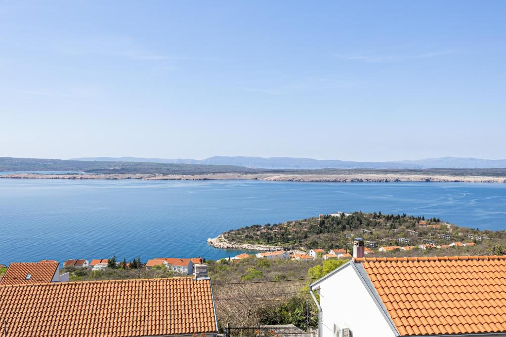 a view of a large body of water with red roofs at Casa Vita in Dramalj