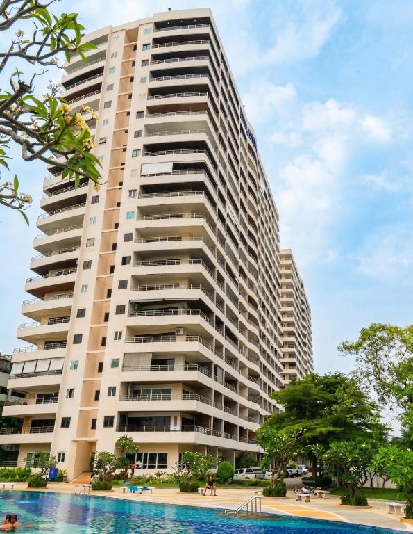 a large apartment building with a pool in front of it at View Talay 3 Apartment in Pattaya South