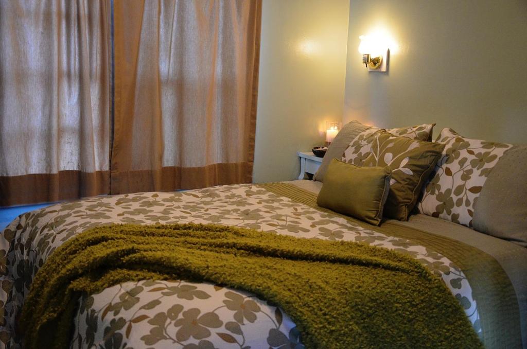 Postel nebo postele na pokoji v ubytování Agate Beach Motel