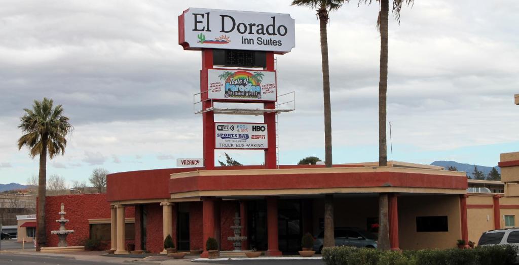 a fast food restaurant with a sign on top of it at El Dorado Inn Suites - Nogales in Nogales
