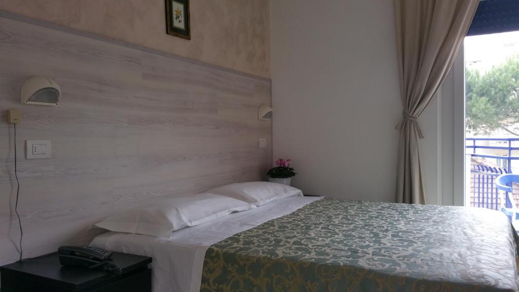 Postel nebo postele na pokoji v ubytování Hotel Canasta