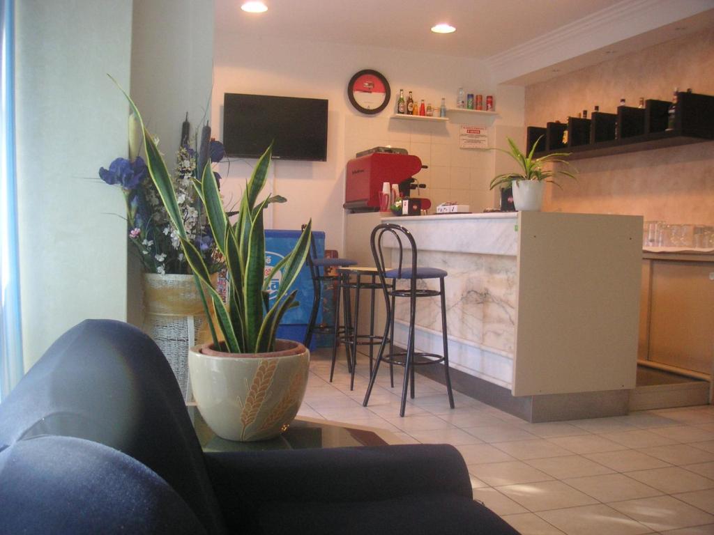 Kuchyň nebo kuchyňský kout v ubytování Hotel Canasta