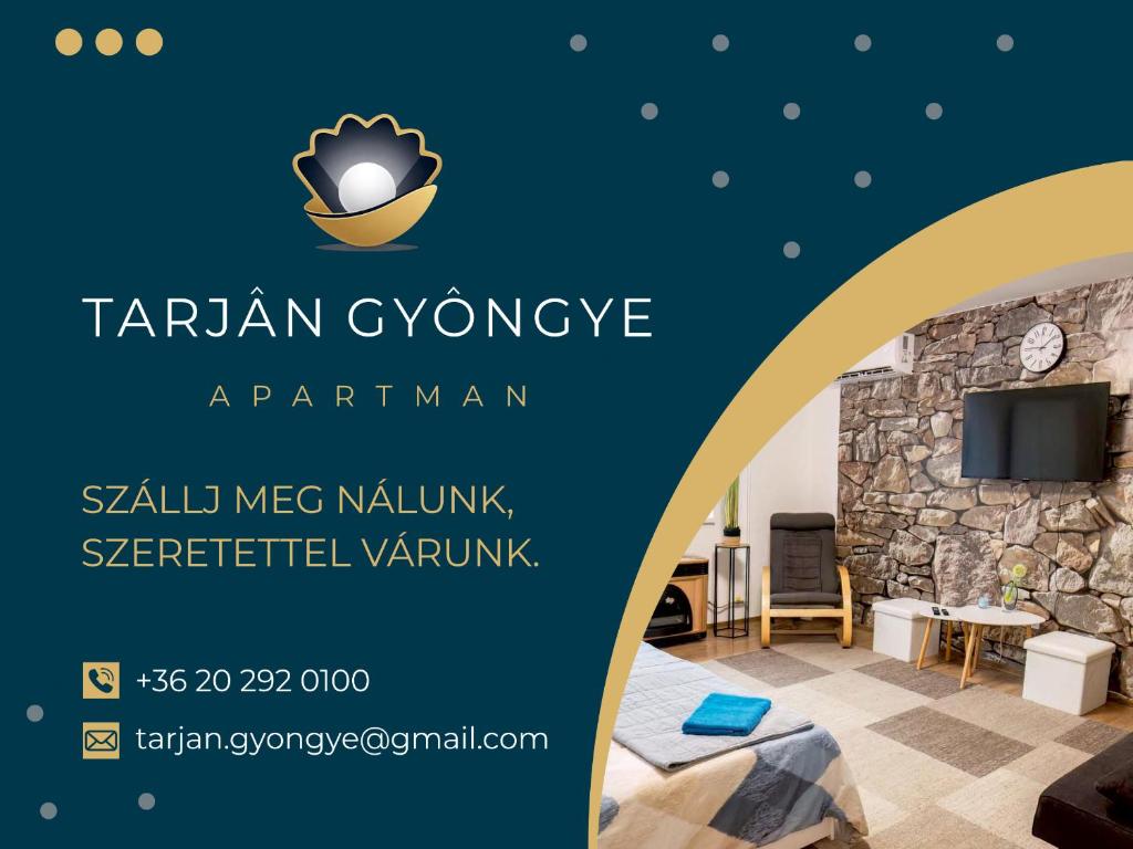 a poster for a hotel room with a stone wall at Tarján Gyöngye in Salgótarján