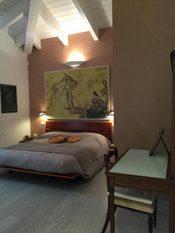 A bed or beds in a room at Bed & Breakfast Case Osti